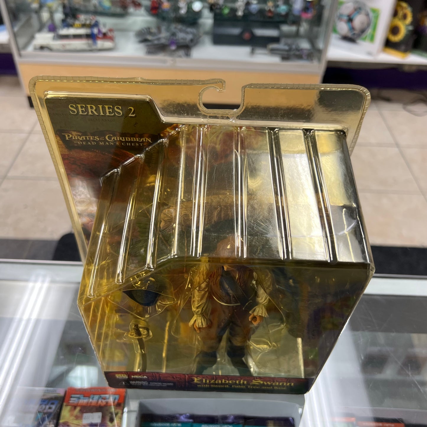 NECA - Pirates of the Caribbean Dead Man's Chest - Elizabeth Swann - Series 2 Action Figure (Yellow Box)